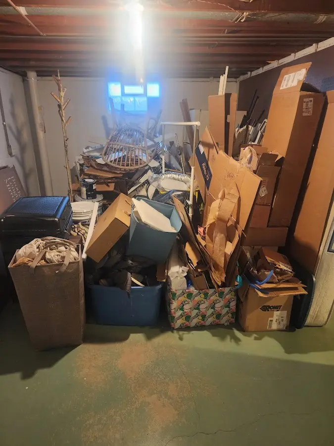 Roll-off dumpster container at job site for Cleanout Dumpster Rental in Ludlow